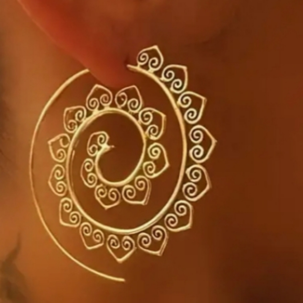 Gold spiral earrings.
